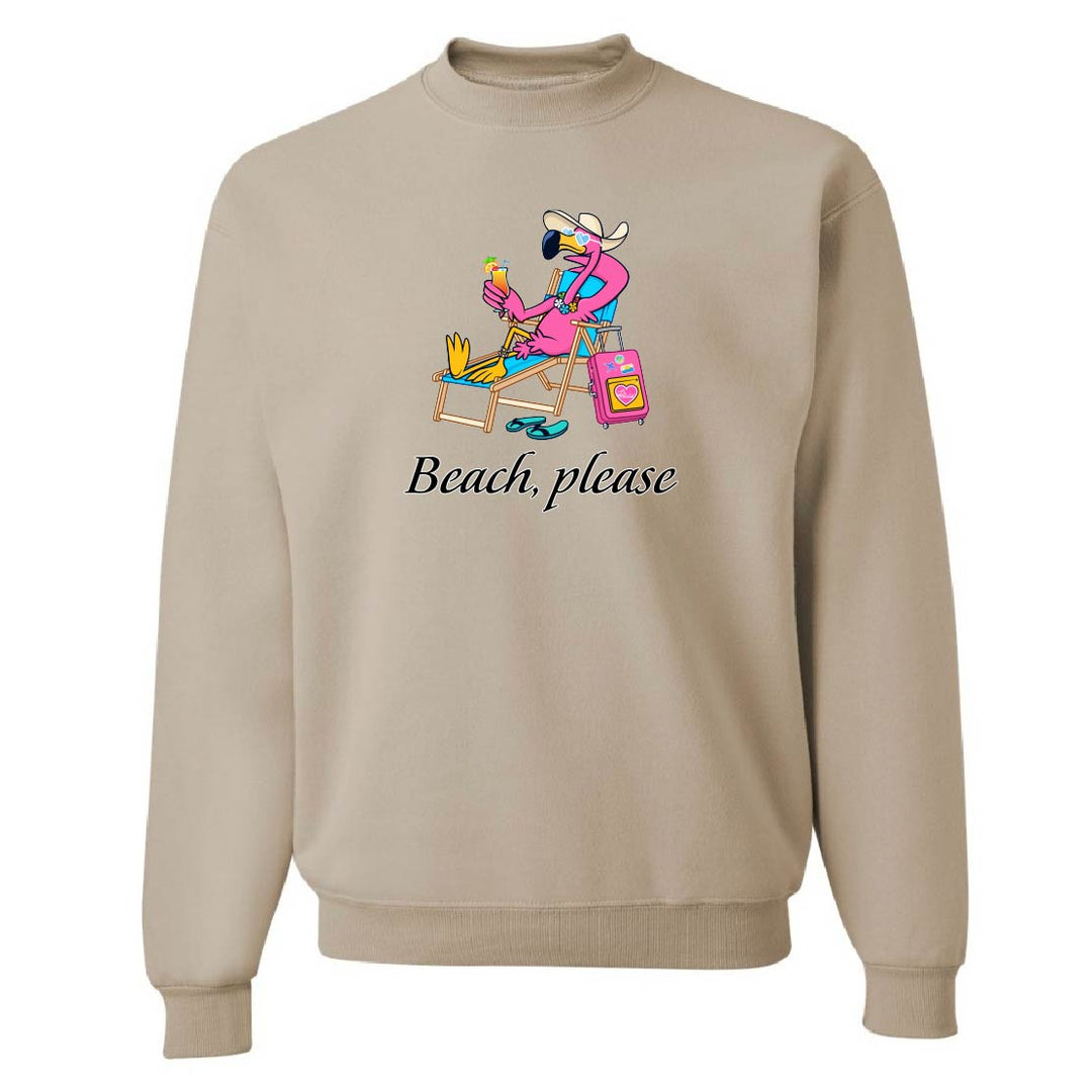 Beige sweatshirt with a cartoon flamingo design and 'Beach, please' text on a white background