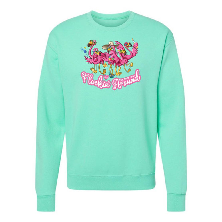 Mint green sweatshirt with flamingo design and text on a white background