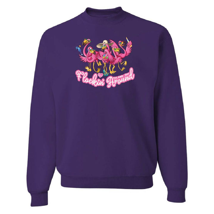 Purple sweatshirt with colorful flamingo design and text on a white background