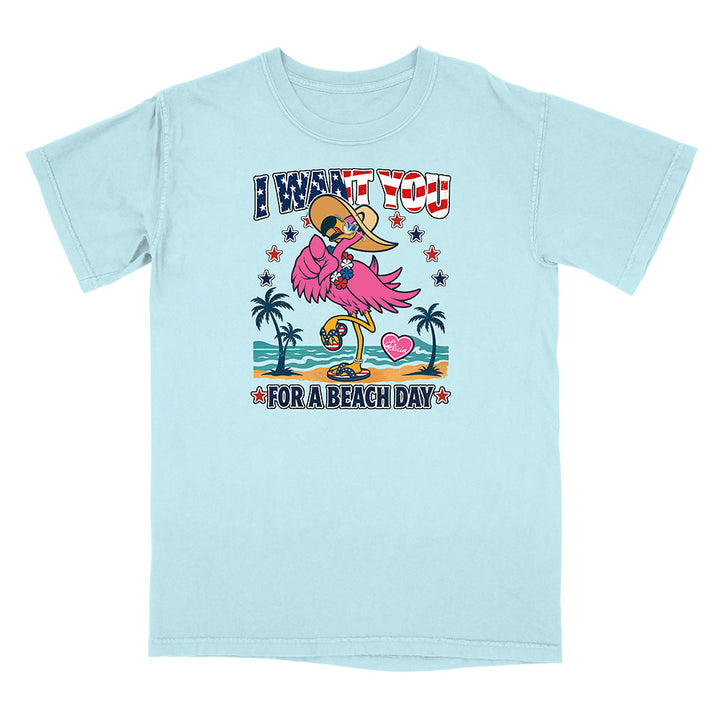 Light blue t-shirt with a flamingo graphic and text on a white background