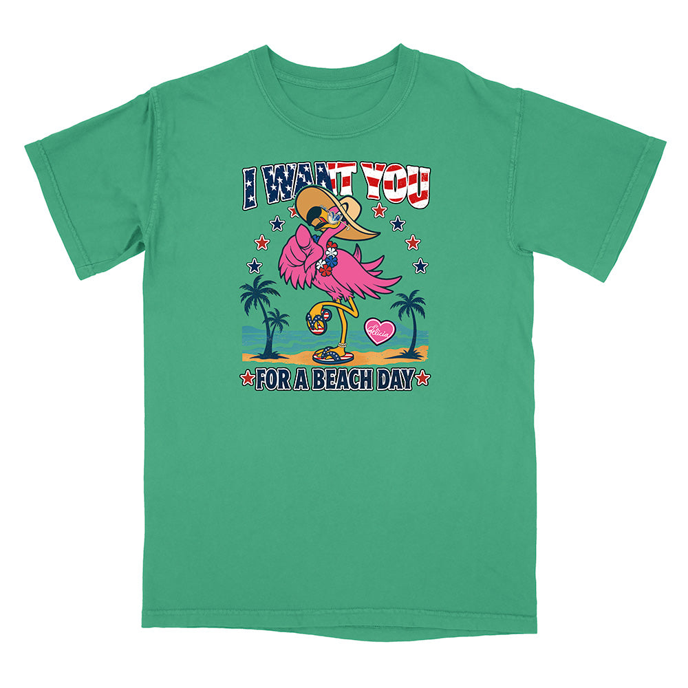 Green t-shirt with a colorful flamingo graphic and text on a white background