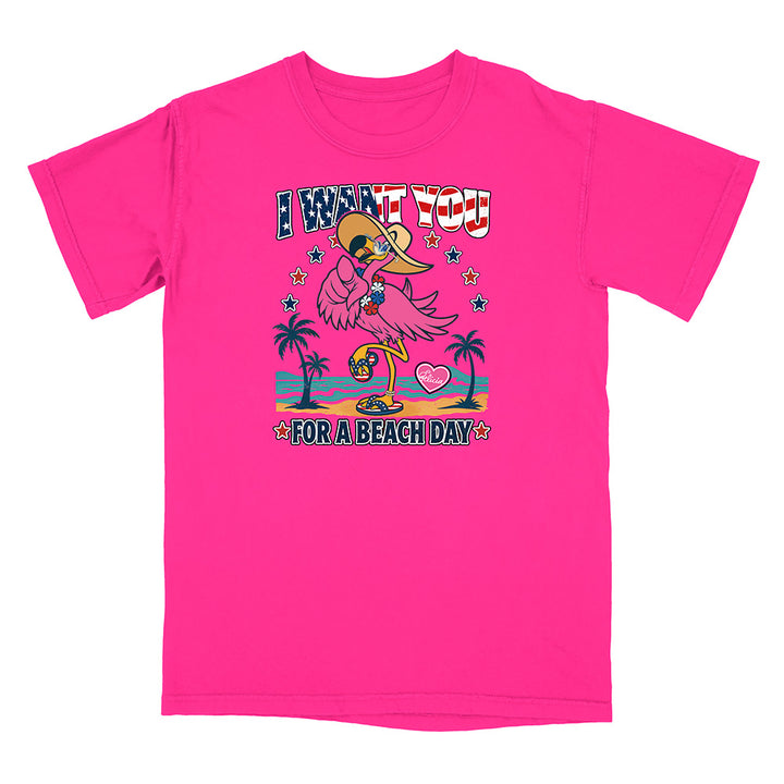 Pink t-shirt with a cartoon flamingo design and text on a white background