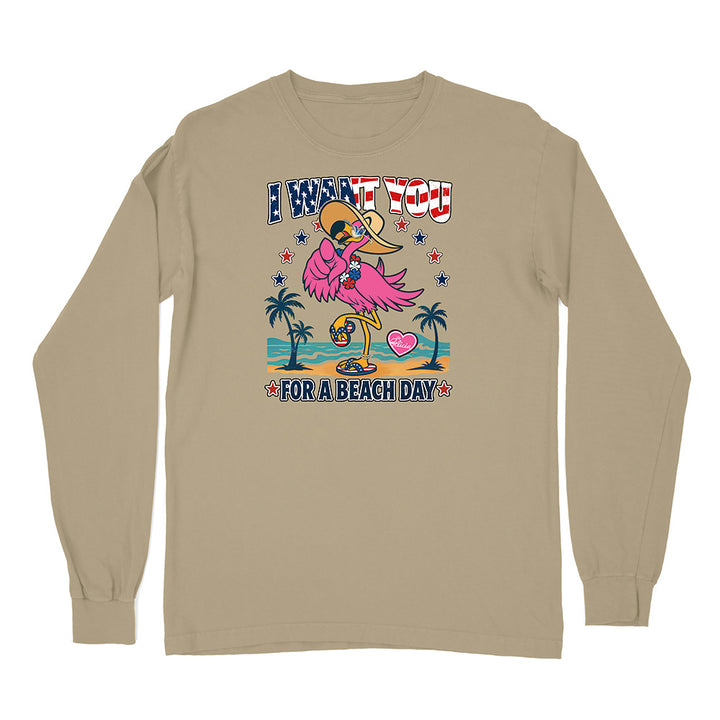 Beige long-sleeve shirt with a colorful graphic of a flamingo and text on a white background