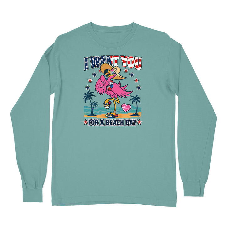 Teal long-sleeve shirt with a colorful graphic and text on a white background