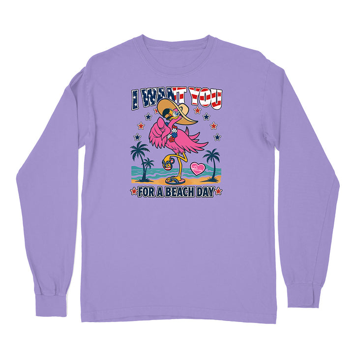 Purple long-sleeve shirt with a flamingo graphic and text on a white background