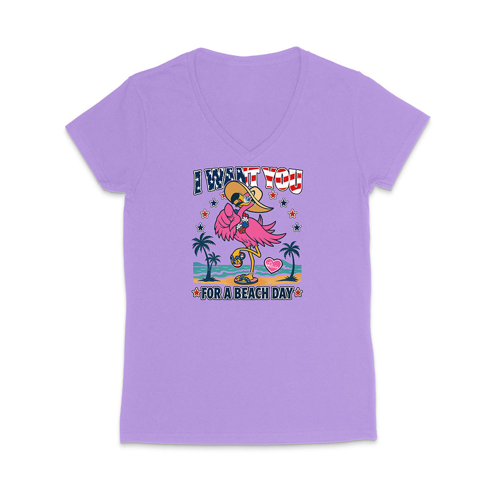 Purple t-shirt with a graphic design of a flamingo and text on a white background