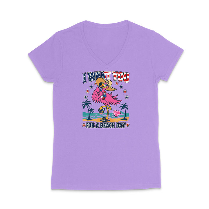 Purple t-shirt with a graphic design of a flamingo and text on a white background