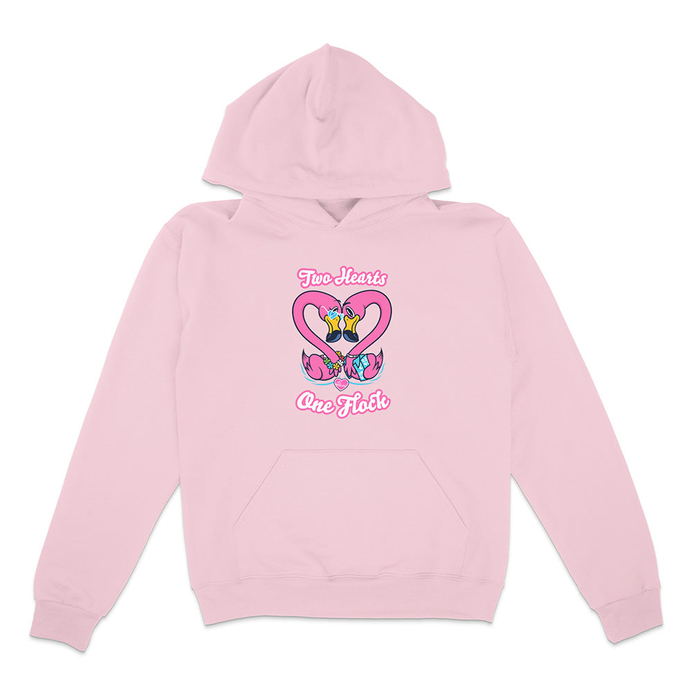 Pink hoodie with heart and bow design on a white background