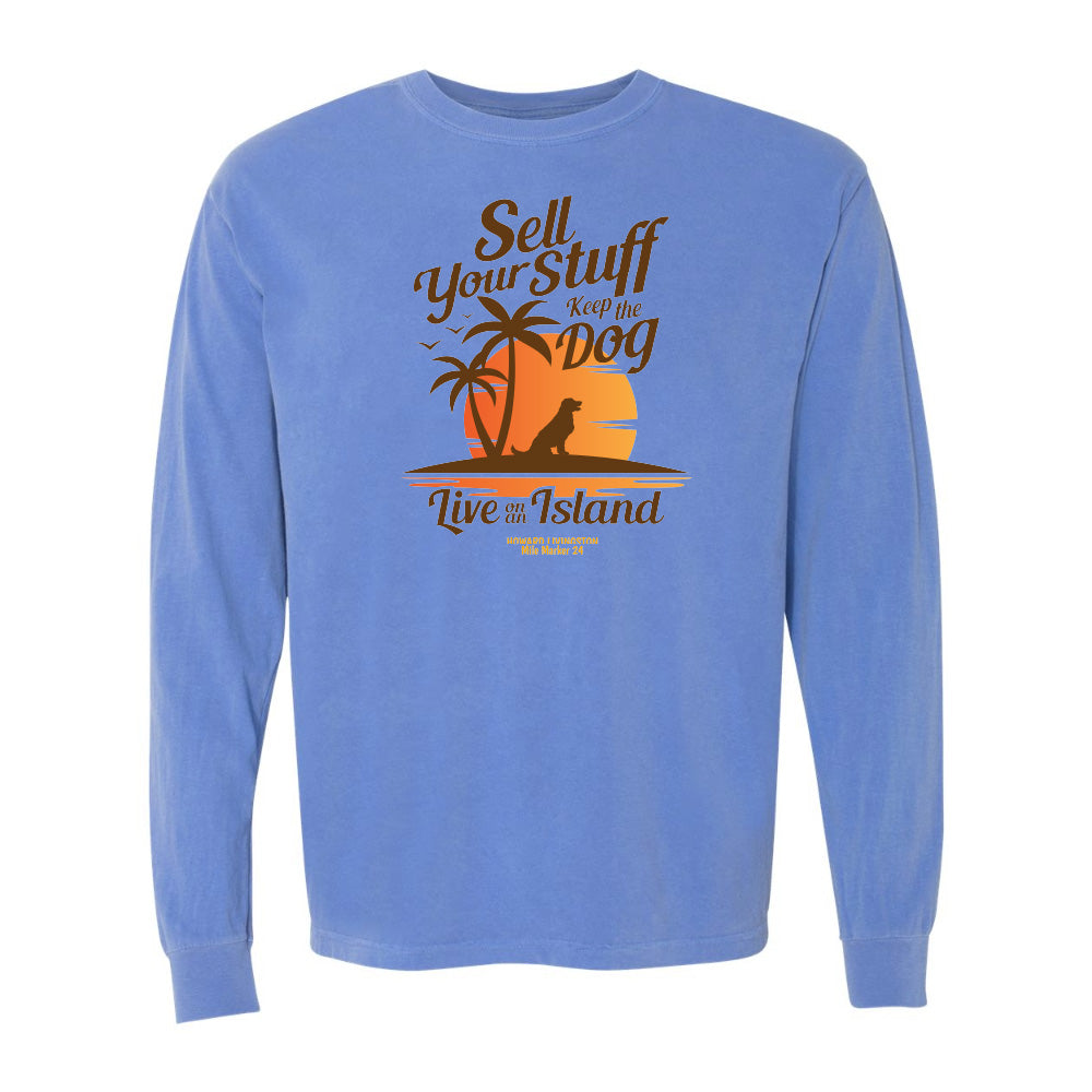 Blue long-sleeve shirt with a graphic design and text on a white background