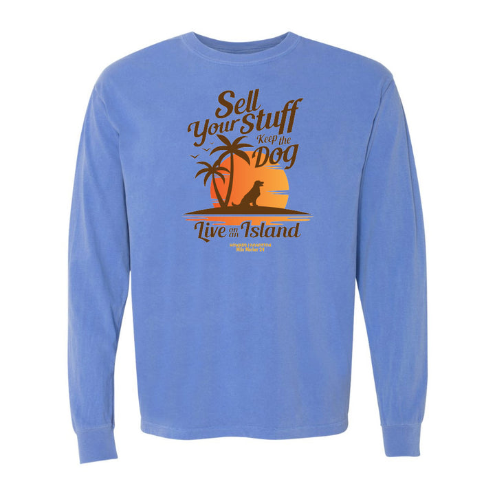 Blue long-sleeve shirt with a graphic design and text on a white background