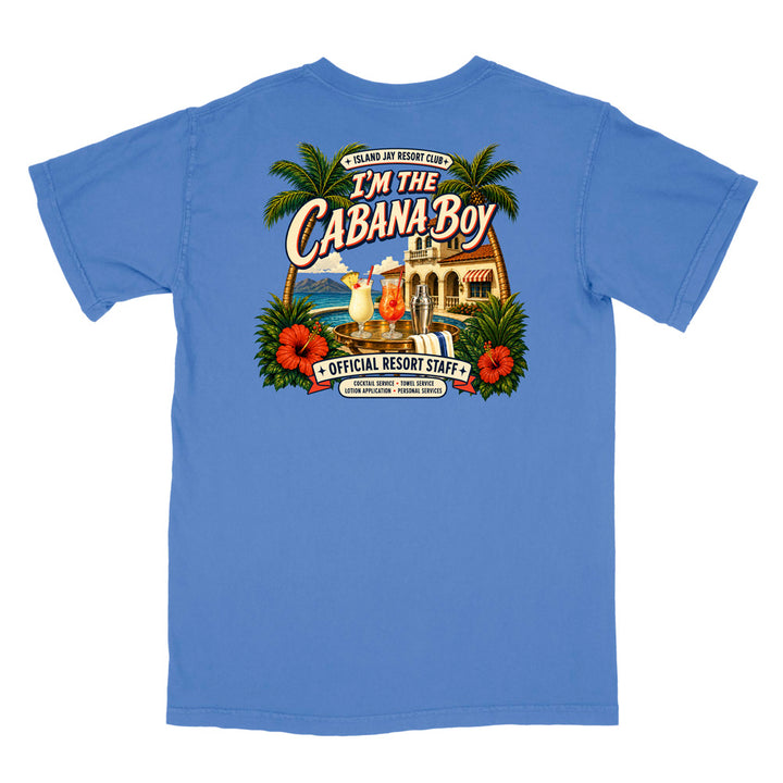 A blue short-sleeve t-shirt shown from the back, featuring a large, colorful graphic print with palm trees, hibiscus flowers, and a resort scene with the text 'I'm The Cabana Boy' and 'Official Resort Staff'.
