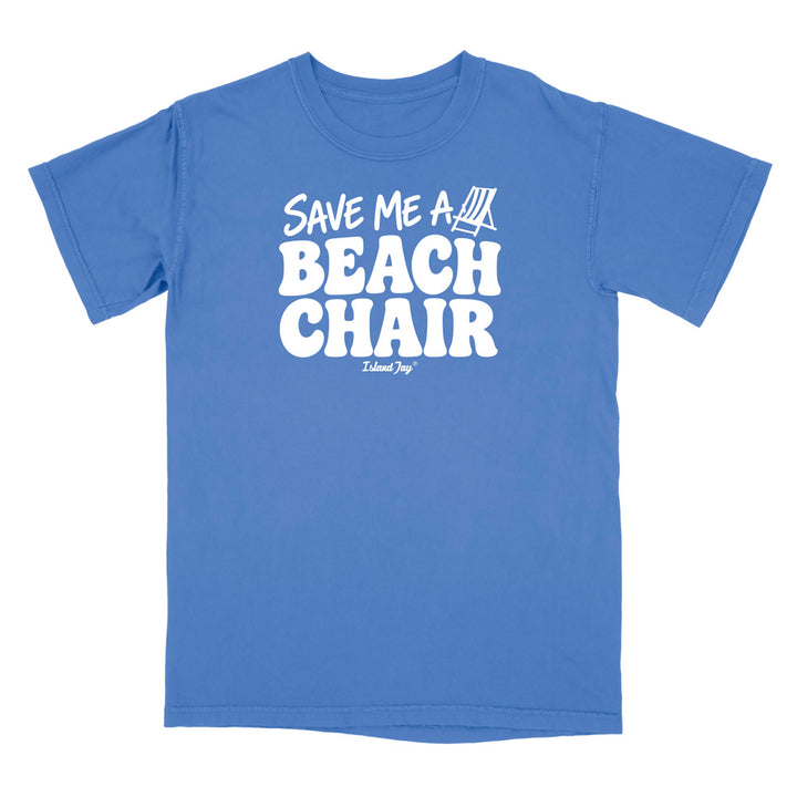 A blue short-sleeve t-shirt with a white graphic print on the front that reads 'SAVE ME A BEACH CHAIR' 