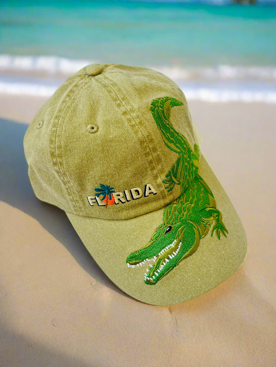 Khaki hat with a big alligator on it and the word "Florida"