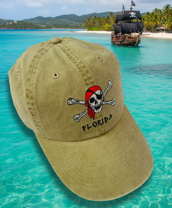 Pirate-themed cap with 'Florida' on a tropical beach with a pirate ship in the background.