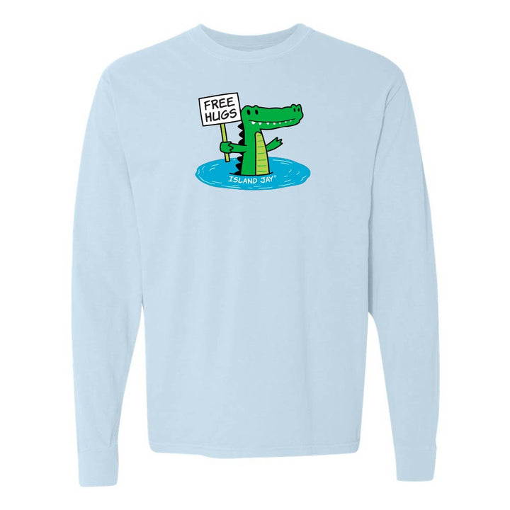Light blue long-sleeve shirt with a cartoon alligator holding a 'Free Hugs' sign.