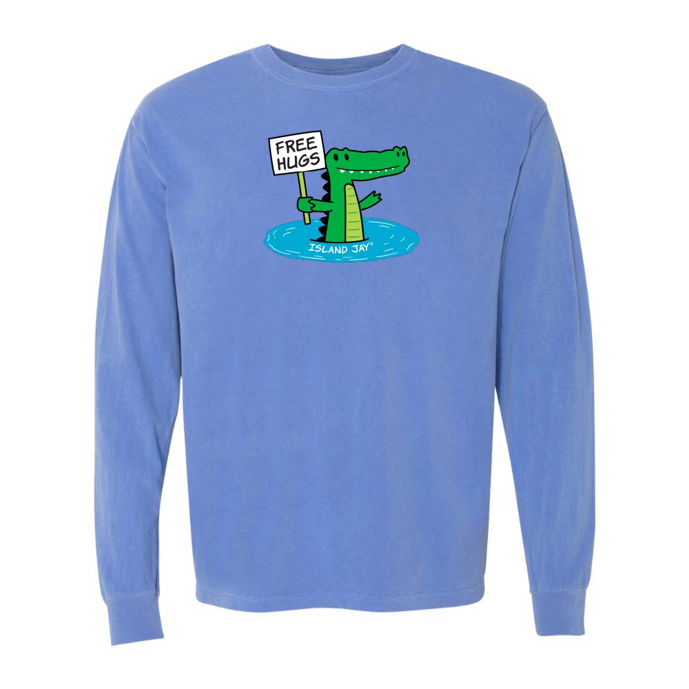 Blue long-sleeve shirt with a cartoon alligator holding a 'Free Hugs' sign.