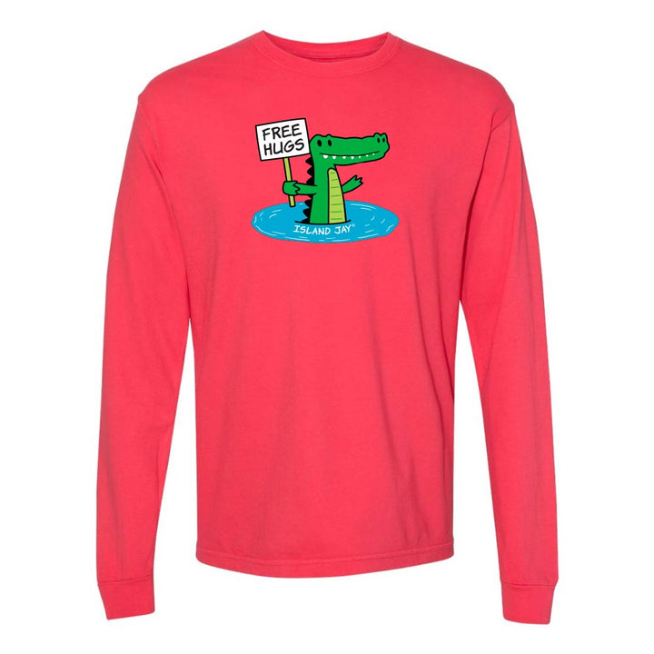 Red long-sleeve shirt with a cartoon alligator holding a 'Free Hugs' sign.