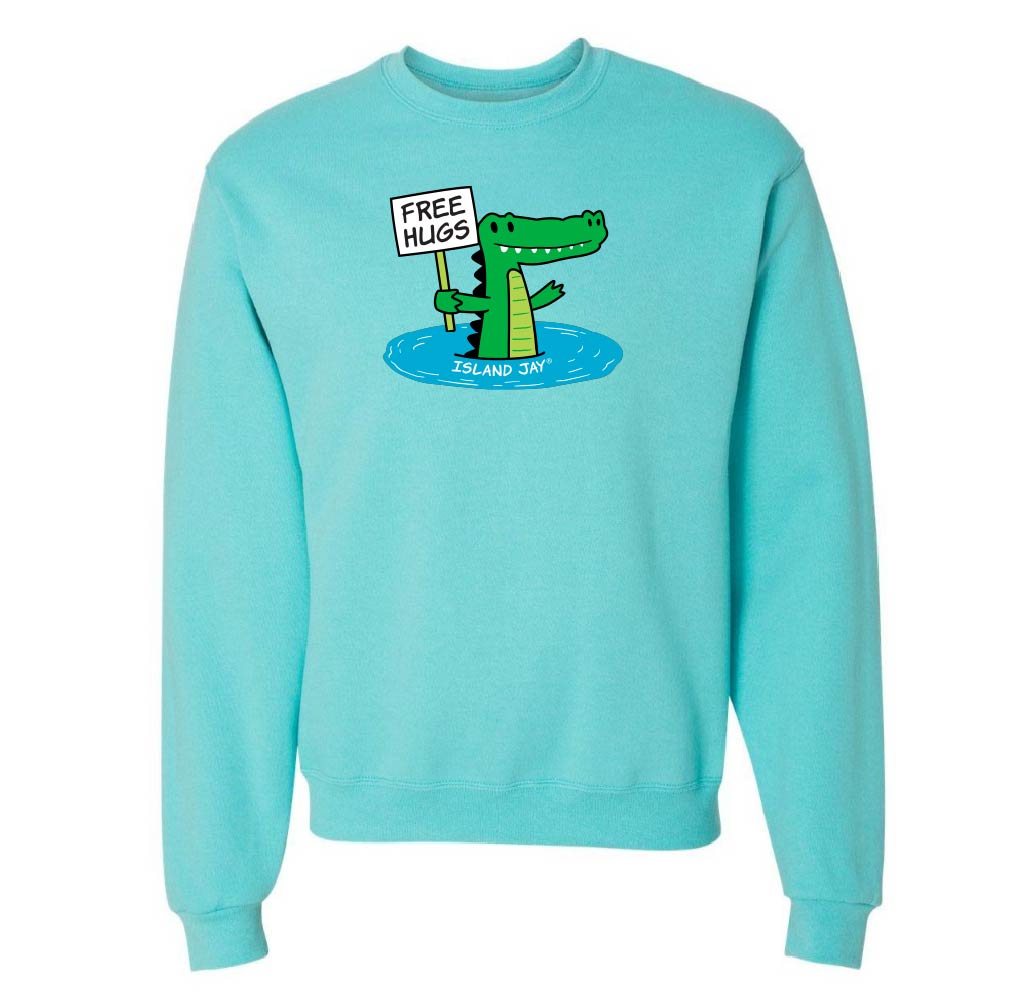 Light blue sweatshirt with a cartoon alligator holding a 'Free Hugs' sign on a white background
