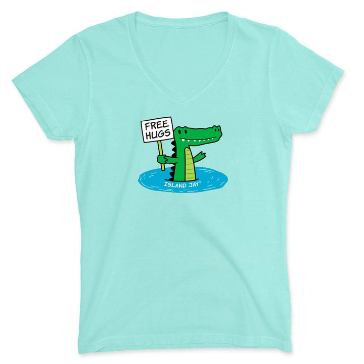 Mint green shirt with cartoon alligator graphic and text reading "Free Hugs".