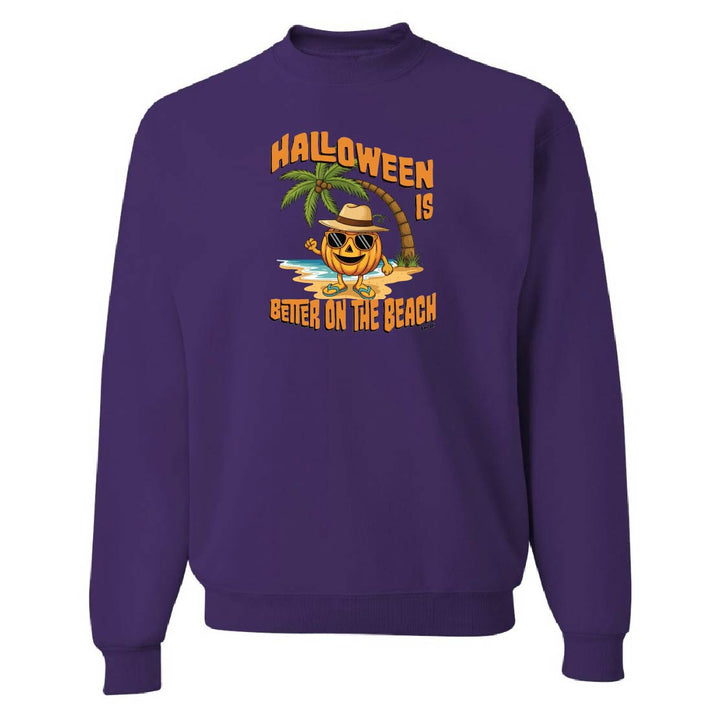 Purple sweatshirt with Halloween design of a palm tree and beach scene on a white background