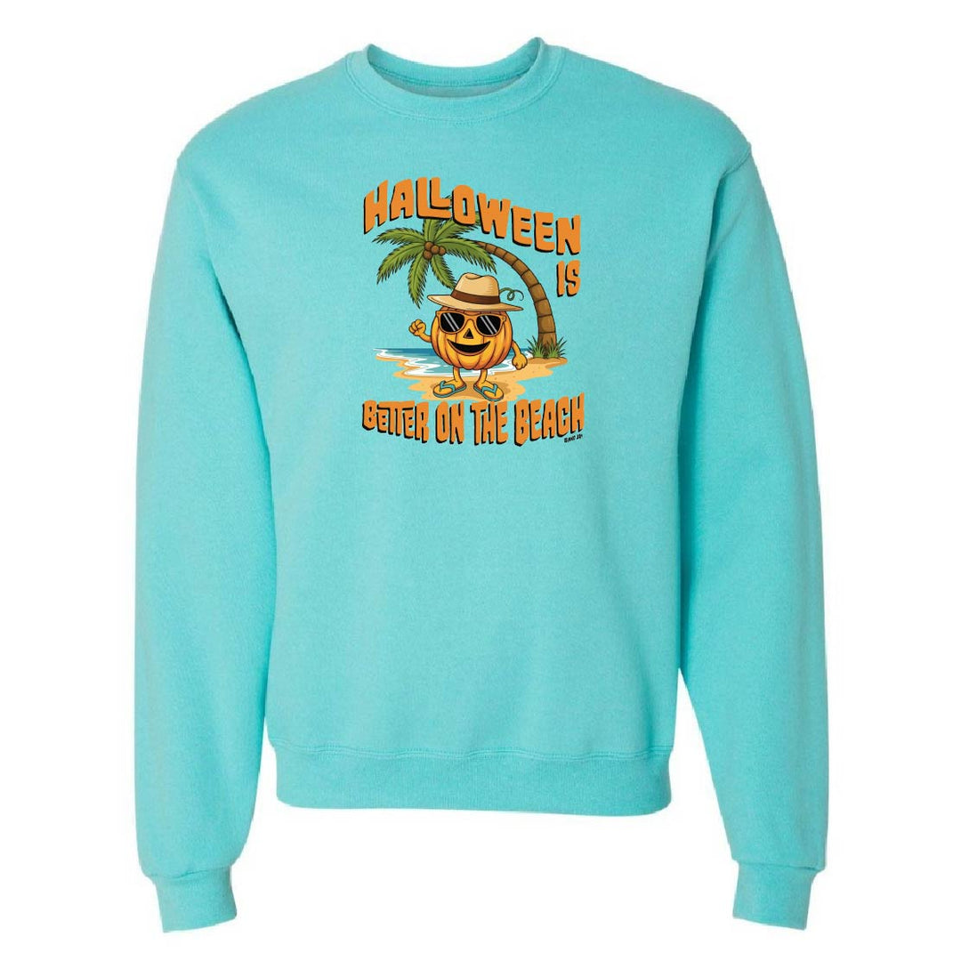 Turquoise sweatshirt with Halloween design featuring a palm tree and pumpkin on a white background