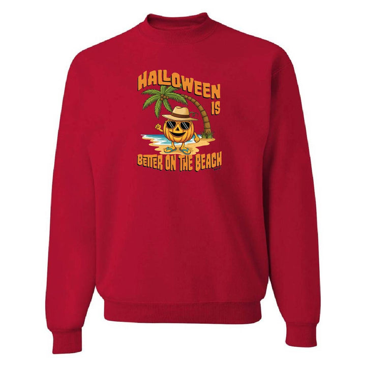 Red sweatshirt with Halloween design featuring a pumpkin on a beach.