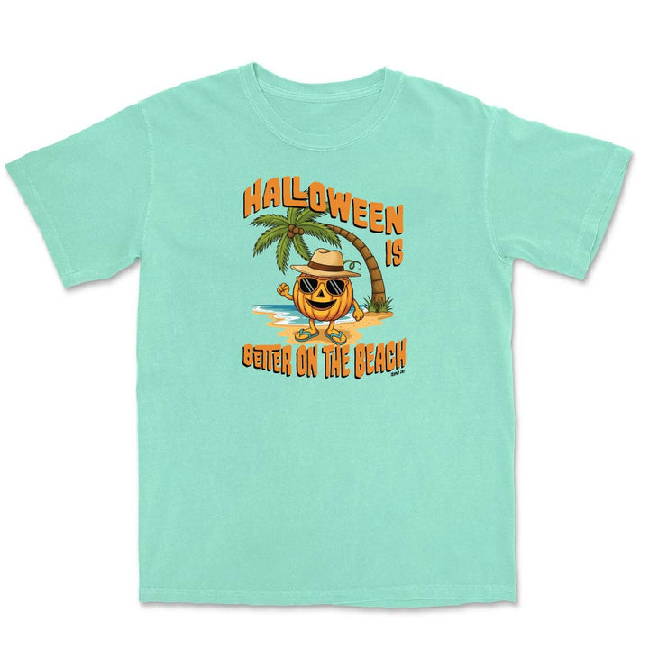 Light blue t-shirt with Halloween design featuring a pumpkin, palm tree, and text on a white background