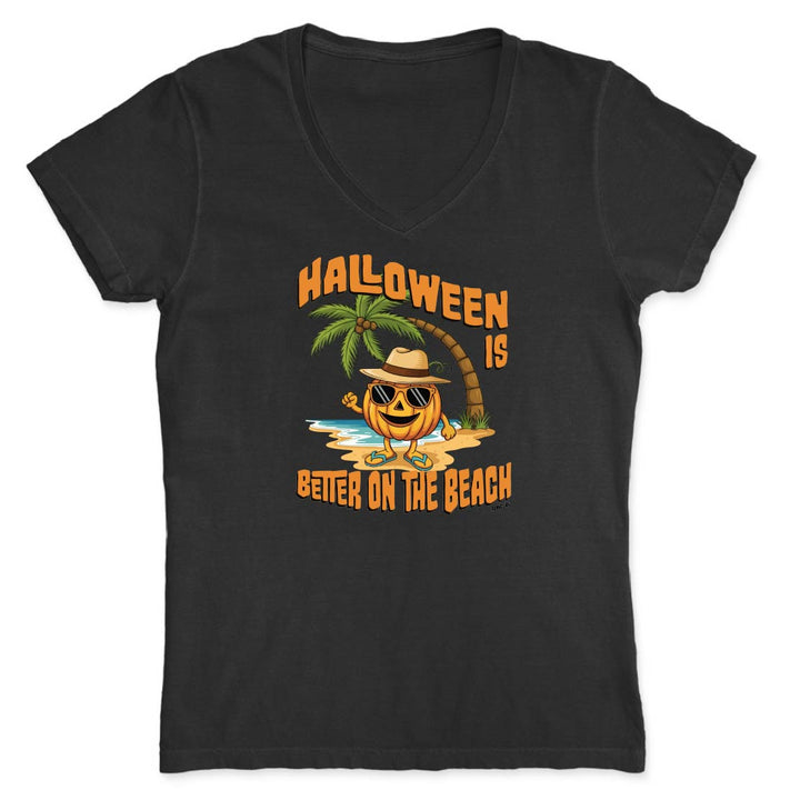 Black t-shirt with Halloween-themed design of a pumpkin on a beach.