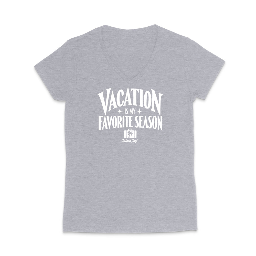 A heather gray short-sleeve V-neck t-shirt with a white graphic print on the front that reads 'VACATION IS MY FAVORITE SEASON' with a small 'Tulum Trip' logo underneath, displayed on a clean white background.