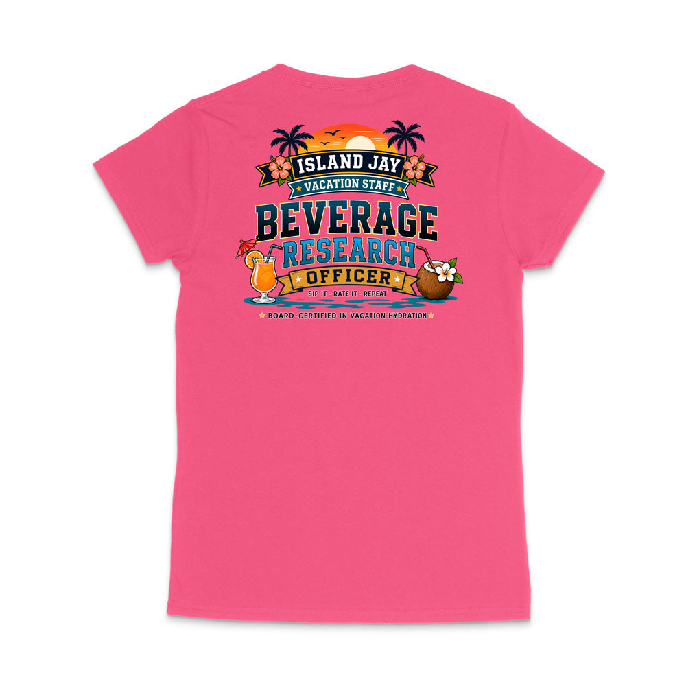 A bright pink short-sleeve t-shirt shown from the back, featuring a colorful graphic print with tropical elements and the text 'ISLAND JAY BEVERAGE RESEARCH OFFICER'.