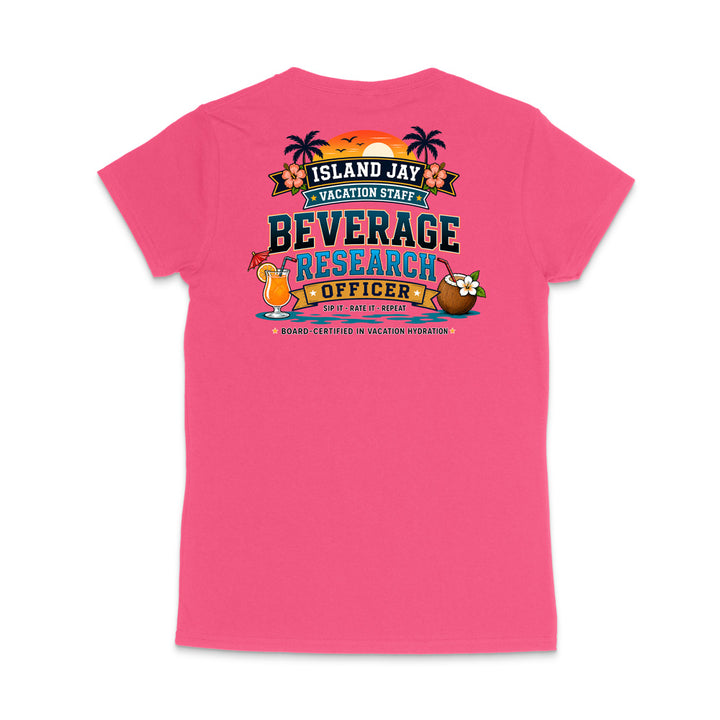 A bright pink short-sleeve t-shirt shown from the back, featuring a colorful graphic print with tropical elements and the text 'ISLAND JAY BEVERAGE RESEARCH OFFICER'.