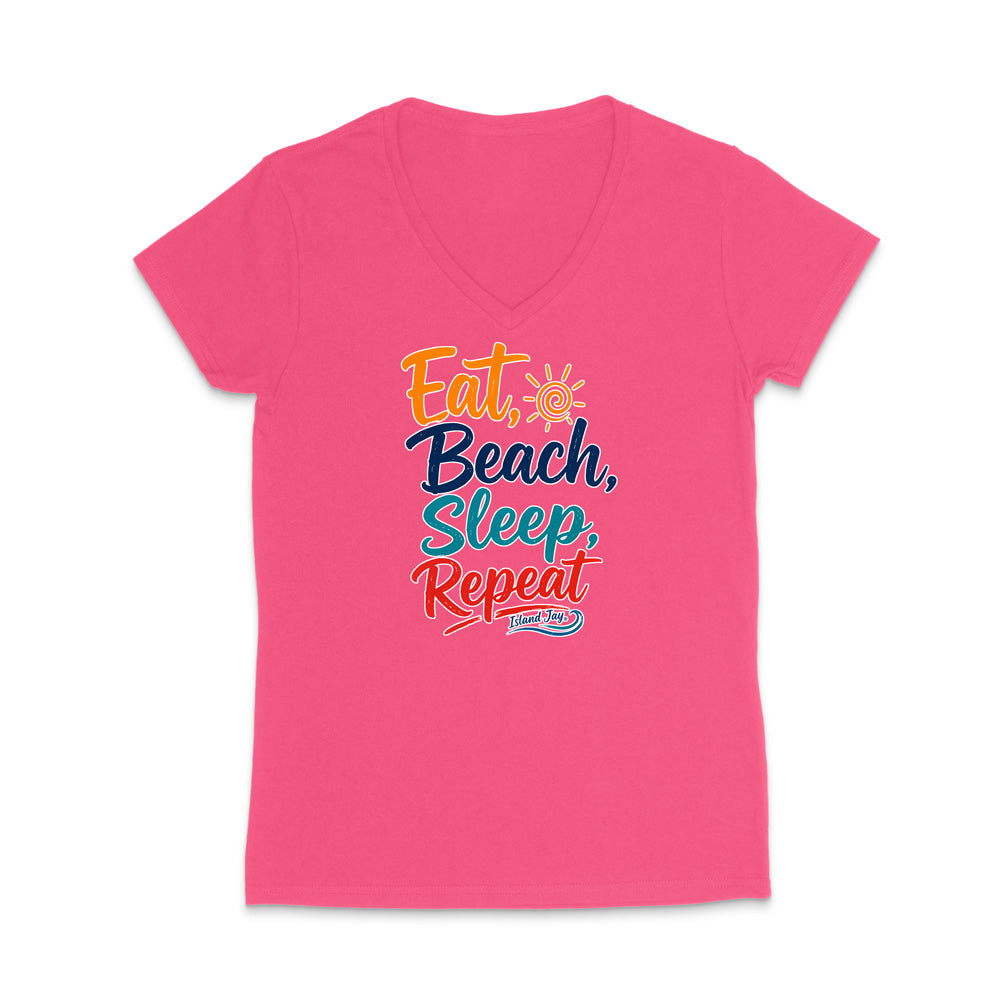 A bright pink women's V-neck t-shirt with a colorful graphic text design on the chest reading 'Eat, Beach, Sleep, Repeat' in orange, yellow, and teal lettering, with a small 'Sunny Side' logo underneath.
