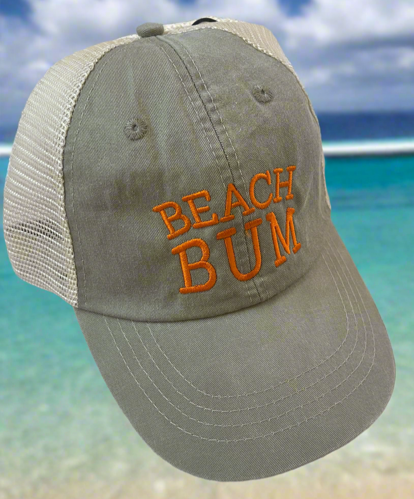 Gray cap with 'BEACH BUM' text on a beach background
