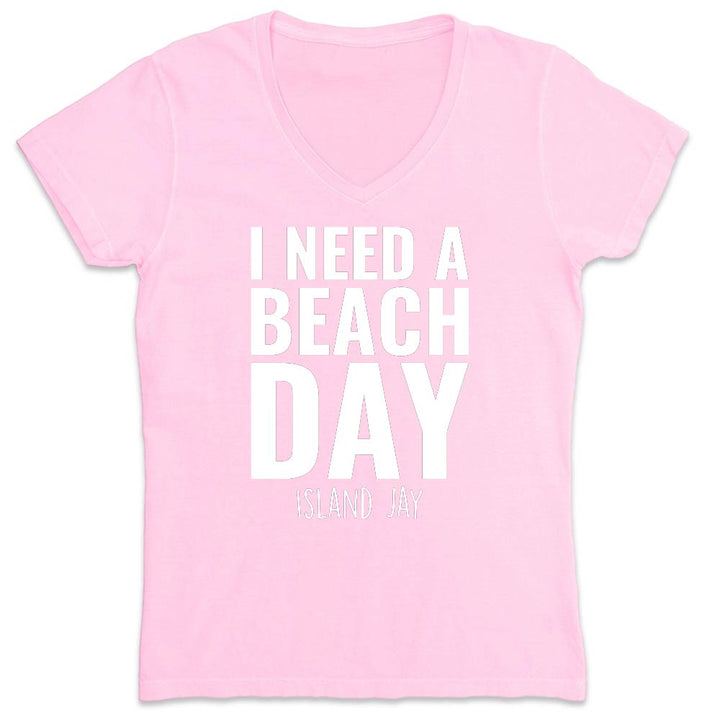 Pink t-shirt with 'I Need a Beach Day' text on a white background