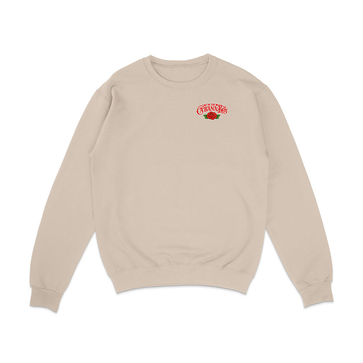 Beige sweatshirt with a logo on the chest against a white background
