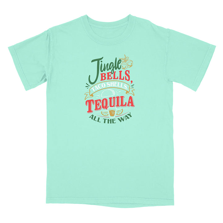 Mint green t-shirt with colorful graphic and text reading "Jingle Bells Taco Shells Tequila All The Way".