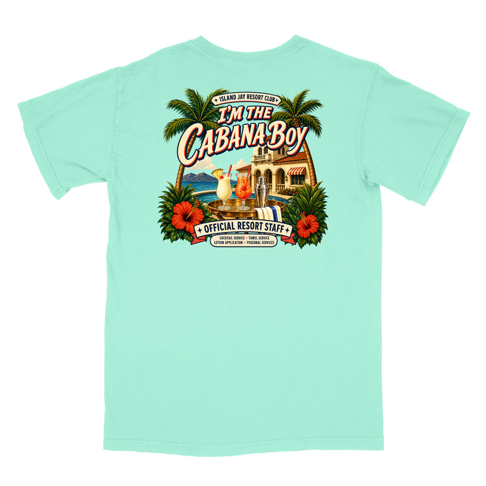 A mint green short-sleeve t-shirt with a large, colorful graphic print on the back. The graphic features palm trees, red hibiscus flowers, a resort building, a beach umbrella, and text that reads 'I'm The Cabana Boy' and 'Official Resort Staff'.