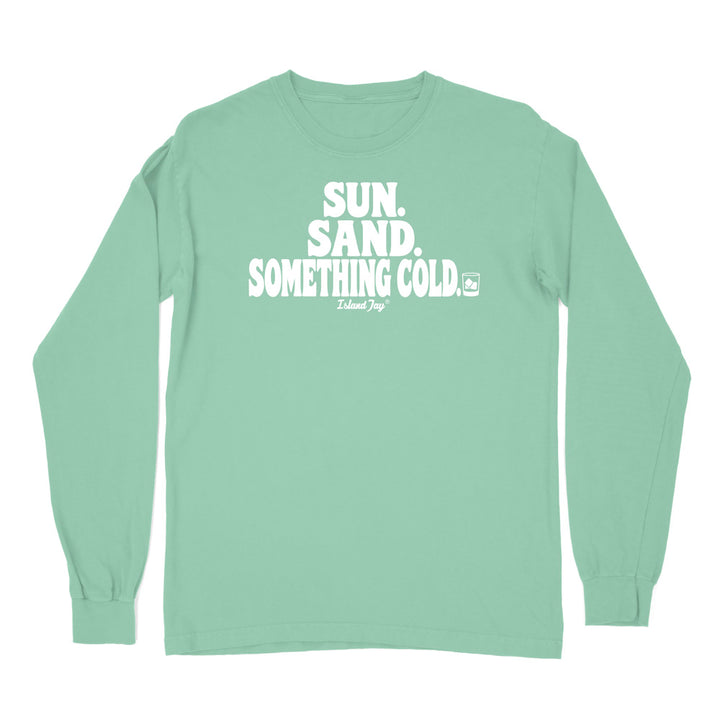 A light green long-sleeve t-shirt with a black graphic text print on the chest reading 'SUN. SAND. Something cold