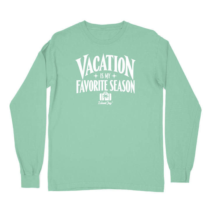 A mint green long-sleeve t-shirt with a white graphic print on the front that reads 'VACATION IS MY FAVORITE SEASON' 