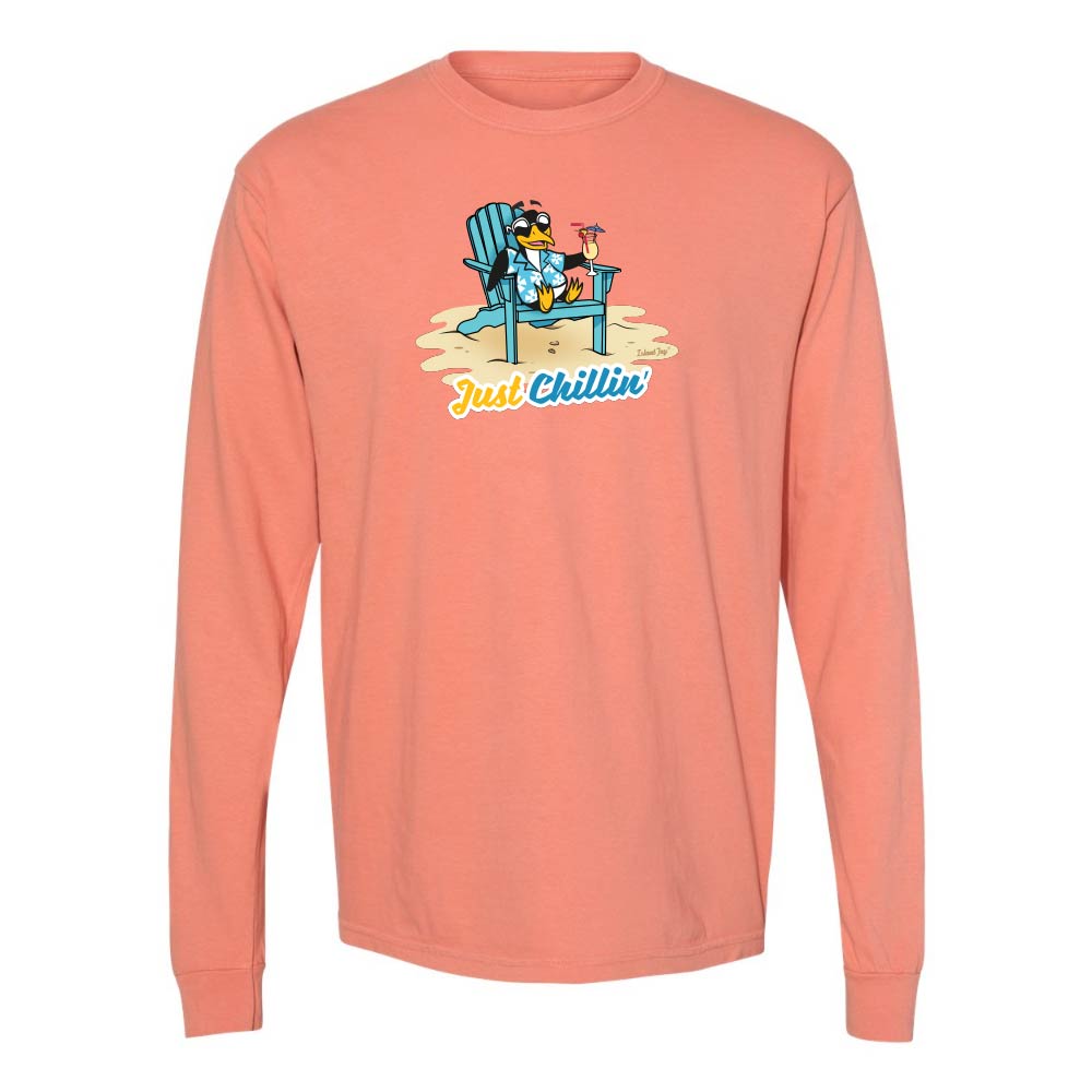 Light orange long-sleeve shirt with a graphic of a penguin in an armchair and 'Just Chillin' text.