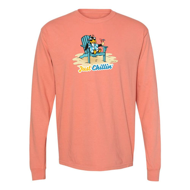 Light orange long-sleeve shirt with a graphic of a penguin in an armchair and 'Just Chillin' text.