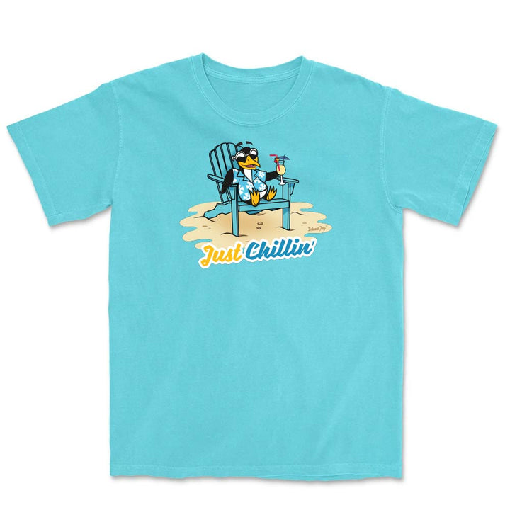 Light blue t-shirt with a cartoon penguin in a chair and 'Just Chillin' text on a white background