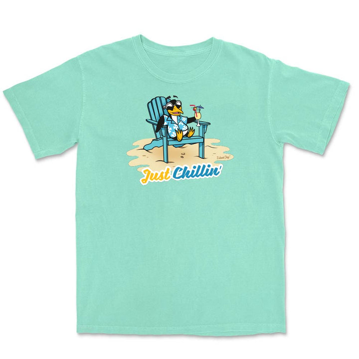 Light green t-shirt with a cartoon penguin in a chair and 'Just Chillin' text on a white background