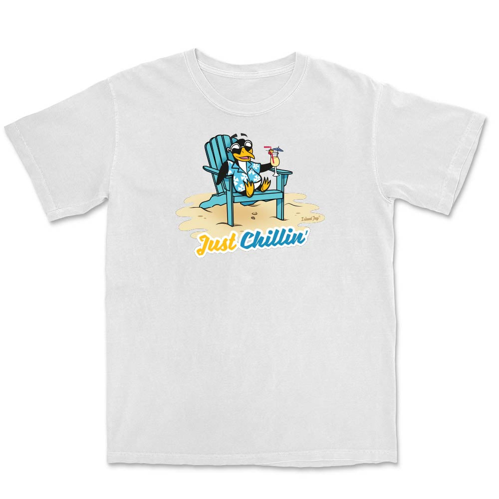 White t-shirt with a cartoon penguin in a chair and 'Just Chillin' text on a white background