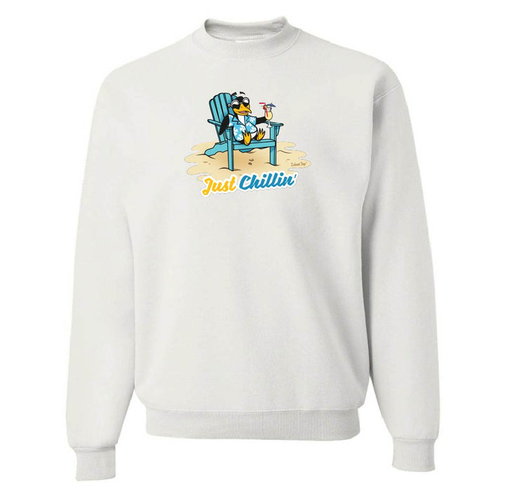 White sweatshirt with a graphic of a penguin sitting on a chair and text 'Just Chillin' on a white background