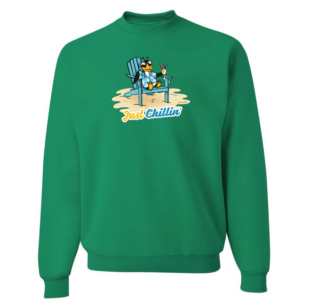 Green sweatshirt with a graphic of a penguin on a beach chair and 'Just Chillin' text.