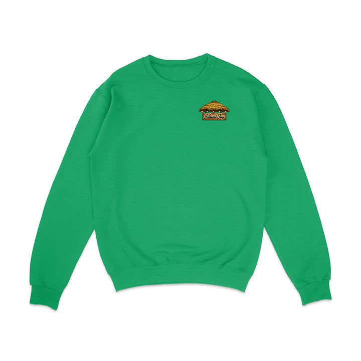 A bright green crewneck sweatshirt with a small graphic of a hamburger on the left chest containing the text 'Tacos & Tamales'. The sweatshirt is displayed flat against a plain white background.
