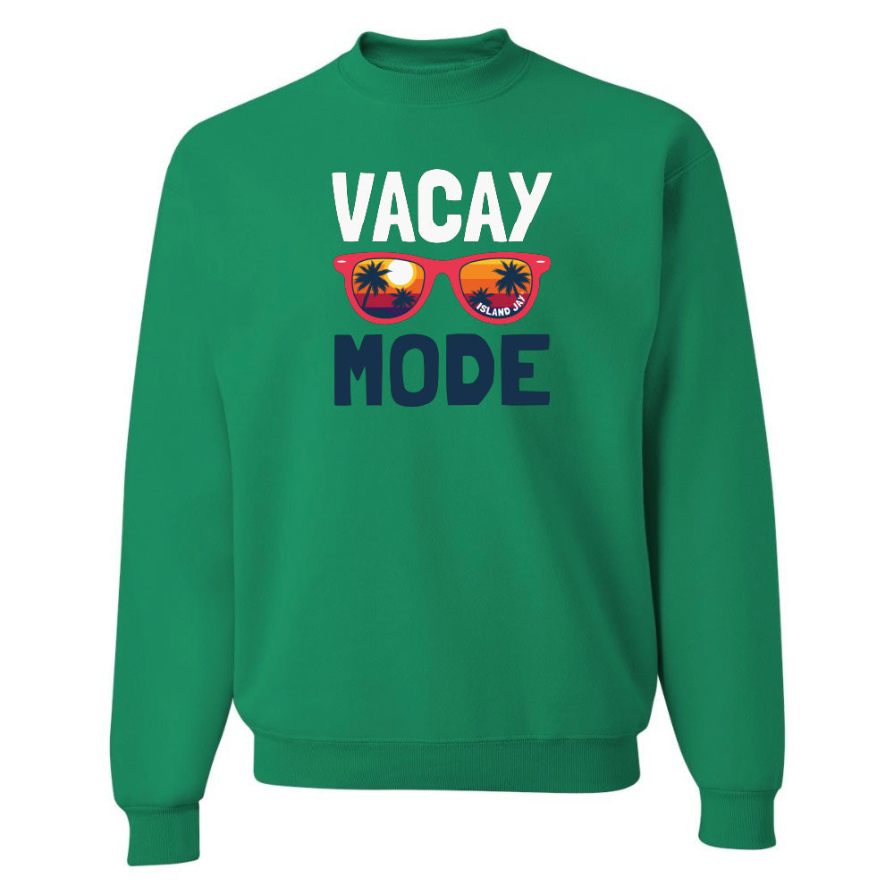 Green sweatshirt with 'Vacay Mode' text and sunglasses graphic on a white background