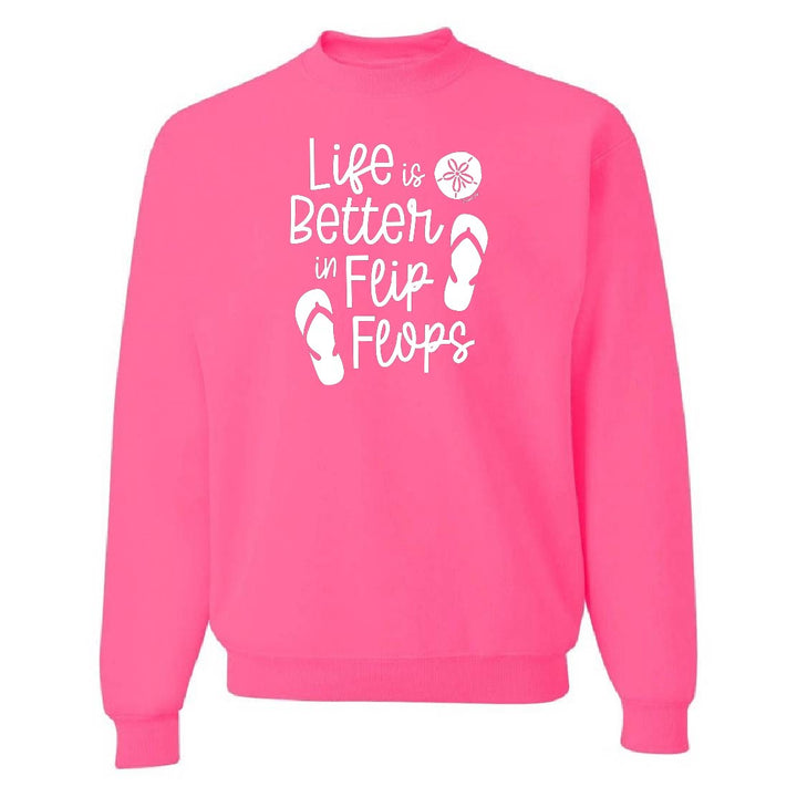 Pink sweatshirt with 'Life is Better in Flip Flops' text and flip flop icons on a white background