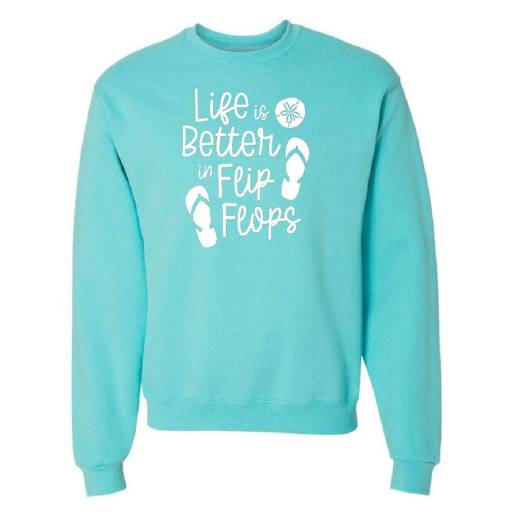 Turquoise sweatshirt with 'Life is Better in Flip Flops' text and flip flop graphics on a white background